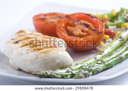 steak barbecued chicken with vegetables isolated ove white