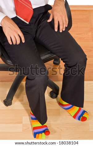 Businessman wearing unusual colorful socks