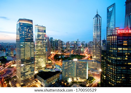 Shanghai, China, August 15, 2013: A view at Pudong Skyline in Shanghai, thriving city in China. Beautiful sunset night view