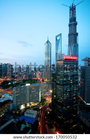 Shanghai, China, August 15, 2013: A view at Pudong Skyline in Shanghai, thriving city in China. Shanghai Tower will be the tallest building in China which is still under construction.