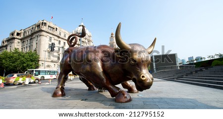 Shanghai, China - August 6, 2014: Wall street bull at the Shanghai Bund area