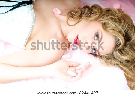 Sensual caucasian brunette blond model dreaming on sofa
