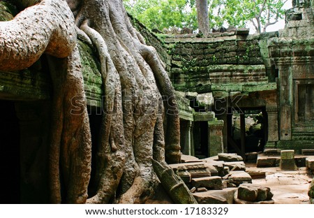 The new FanClans ideetjes - Pagina 3 Stock-photo-devoured-by-rainforest-tha-prom-temple-in-angkor-cambodia-17183329