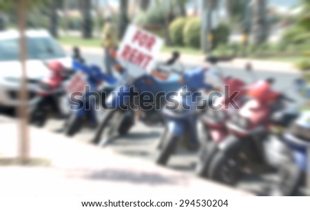 bikes scooter on a renting house-blurred