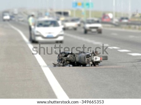 motorcycle accident on the city street blurred