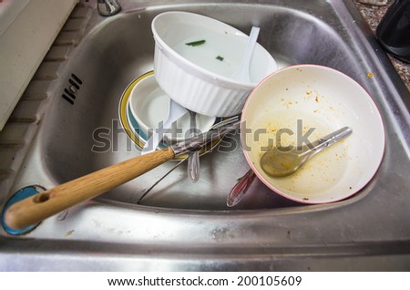 washing-up bow and dishl in kitchen sink