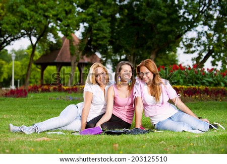 happy young college girls or high school student enjoy in the park/happy young college girls