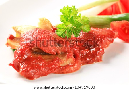 White fish fillets with tomato sauce