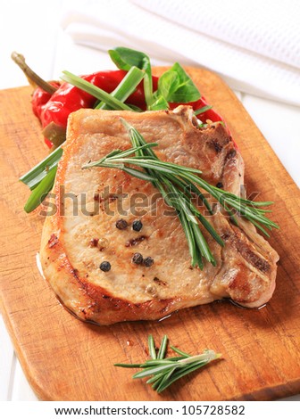Pan fried pork chop with rosemary