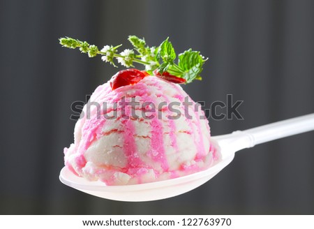 Frozen yogurt ice cream on spoon