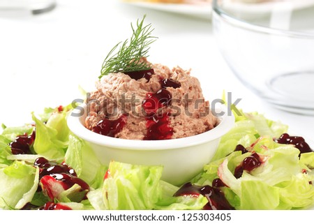 Meat and liver spread with cranberry sauce