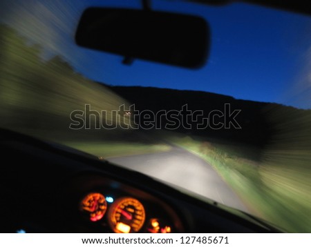 Car driving fast - view from inside a car
