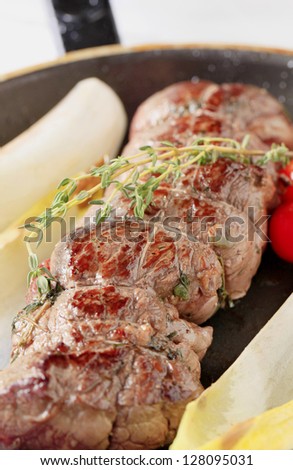 Thyme beef tenderloin with endive leaves