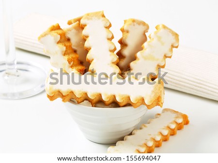 smooth cookies with icing in a bowl