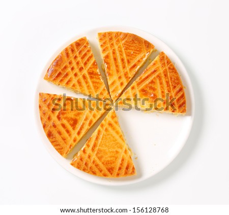 round butter cake, cut into triangles