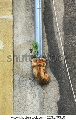 drain pipe on a wet wall