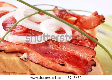 Rashers of tasty bacon on bread