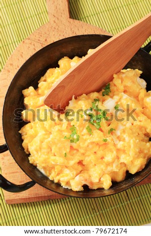 Scrambled eggs ready in a pan- closeup