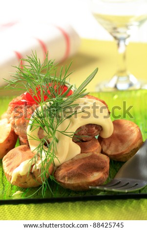 Burger and baked potatoes