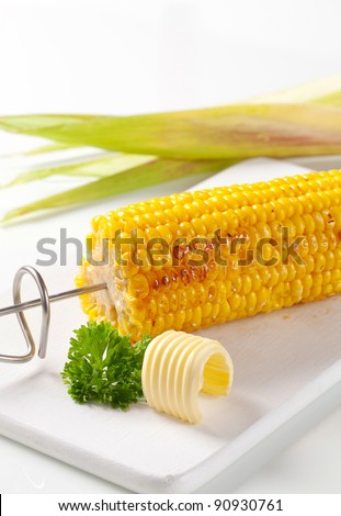 Grilled corn on the cob and butter
