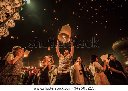 CHIANG MAI,THAILAND-November 25:People release sky lanterns to worship Buddha\'s relics in Yi Peng festival on November 25,2014 in Chiangmai,Thailand.