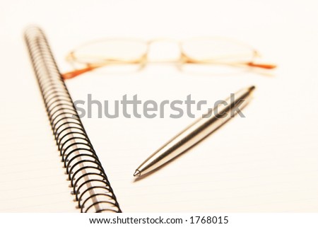 Pen pad glasses on a white background