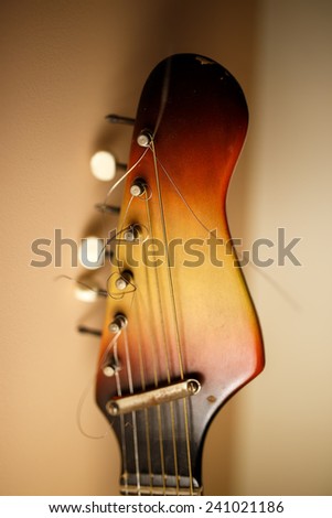Old vintage acoustic guitar head