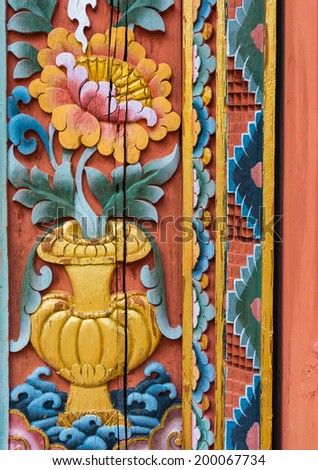 Lotus in vase carved colorful paint on temple door