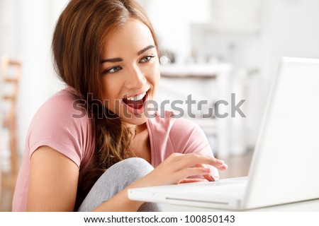 attractive young teenager surfing the internet