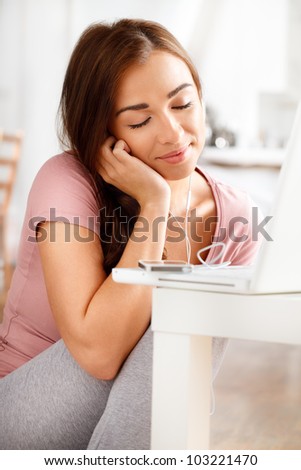 attractive young teenager listing to music