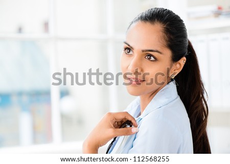 Portrait of attractive Indian businesswoman  working from home