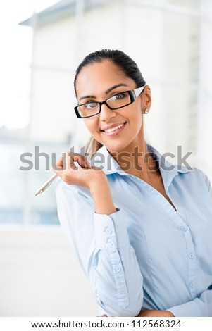 Portrait of attractive Indian businesswoman  working from home