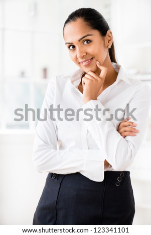 Beautiful Indian business woman portrait smiling happy