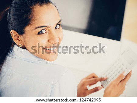 Indian business woman pretty vintage style portrait grade smiling office