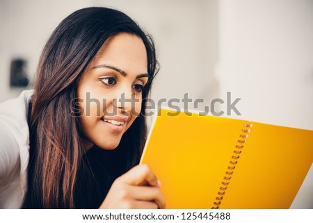 Indian woman student education writing studying