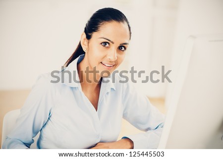 Indian business woman pretty smiling office