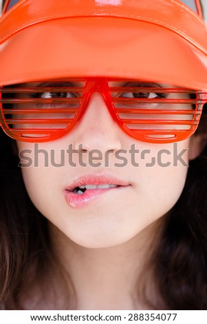 Funky Fashion Model in Orange Visor