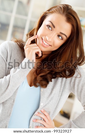 Gorgeous young woman thinking of the future