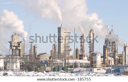A Factory with smokestacks.