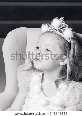 Little girl in princess dress in black and white