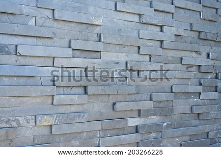 Gray slate wall texture and background