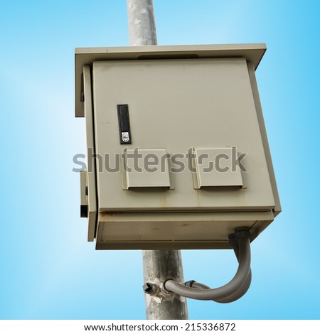 Outdoor electric control box on blue background