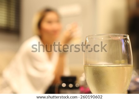 White wine glass with lipstick print on glass