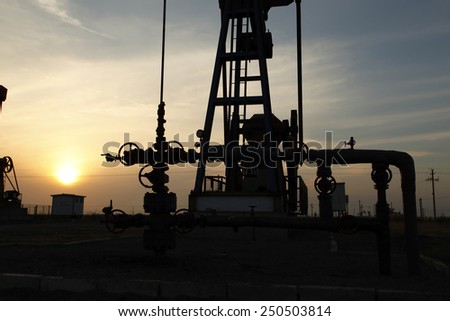 Oil field scene, oil pipelines and facilities