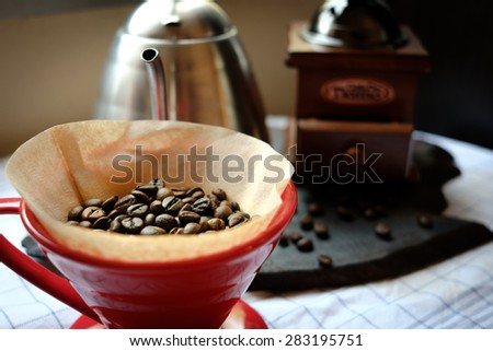 Coffee beans in coffee drip cone