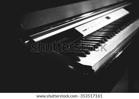 Piano keyboard on focus at first white piano key black and white