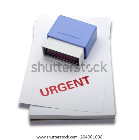 A red color Urgent rubber stamp on memo pad, isolated on white b