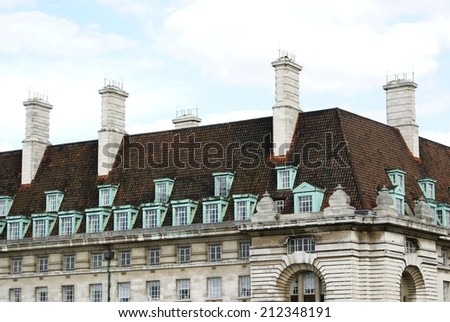 roof with chimneys and dormer windows