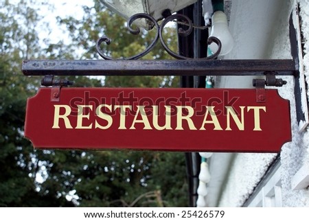 Sign hanged outside a restaurant