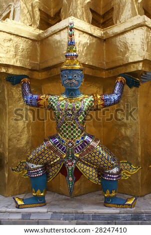 Statue of a soldier outside a temple called Wat Phra Kaew, The Grand Palace, tourist attraction in Bangkok, Thailand, Asia